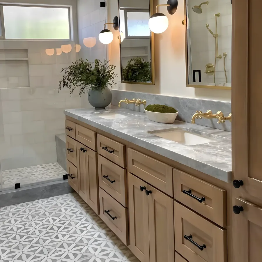 Bathroom with wood vanity and gold fixtures